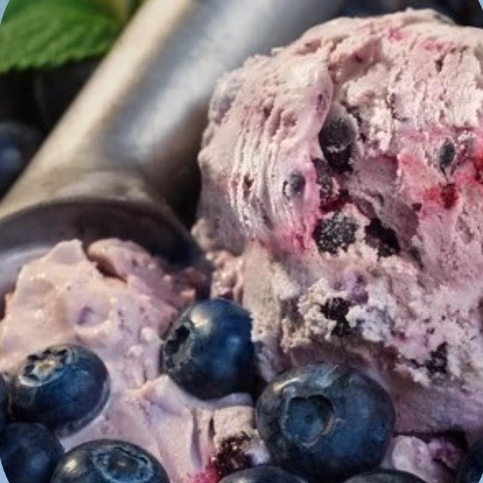 Ice cream scoop with berry ribbon