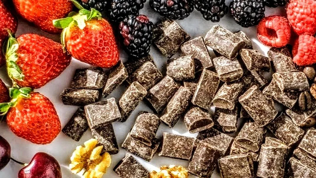 Strawberries, blackberries, raspberries, cherries, chocolate, and walnuts