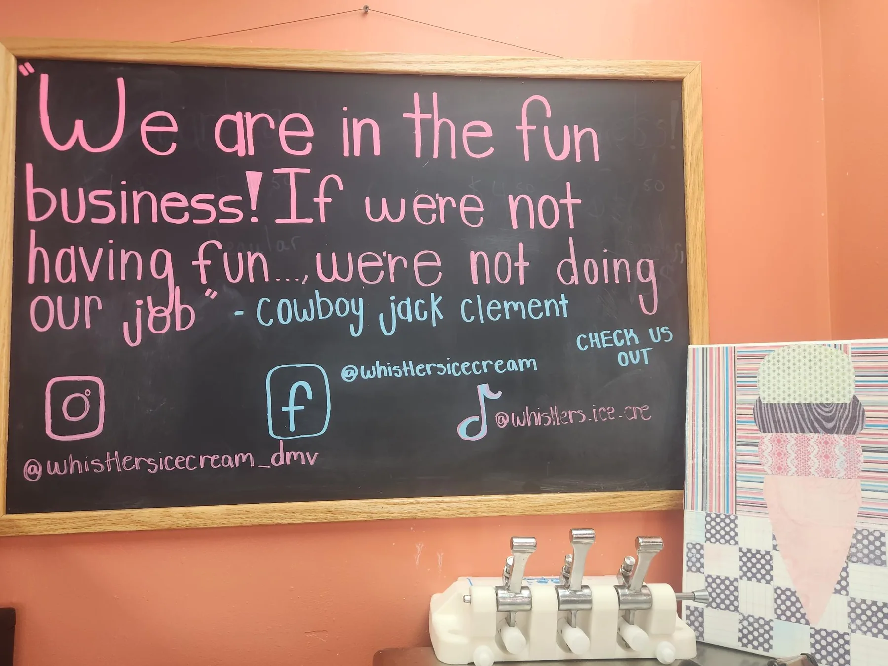 Chalkboard saying Whistler's is in the fun business